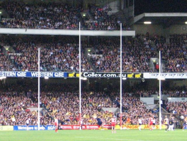 Australian Rules Football in a stadium
